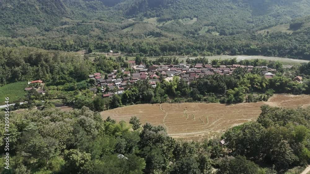custom made wallpaper toronto digitalDrone footage along a traditional wooden village of north Laos and the nearby countryside with rice fields and green vegetation. Camera is moving foward 2-3