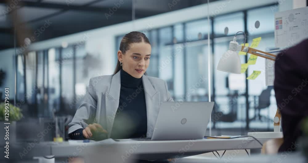 Young Professional Analyzing Business Data on Her Laptop Computer, Striving for Success. Suddenly, Female Manager Erupts in Celebration, Marking a Significant Achievement with a Fist Pump and Smile Young Professional Analyzing Business Data on Her Laptop Computer, Striving for Success. Suddenly, Female Manager Erupts in Celebration, Marking a Significant Achievement with a Fist Pump and Smile