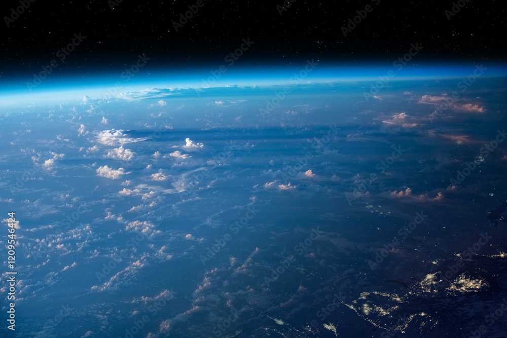 Planet Earth from space. Earth's atmosphere. Observation of the planet Earth from space. On the surface of the planet are visible clouds. Elements of this image furnished by NASA.