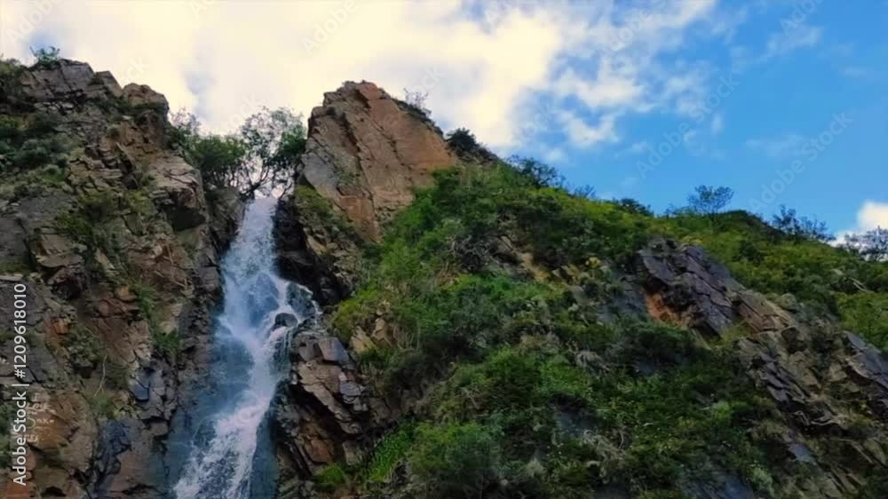 Beautiful Waterfall In The Mountains Beautiful Waterfall In The Mountains