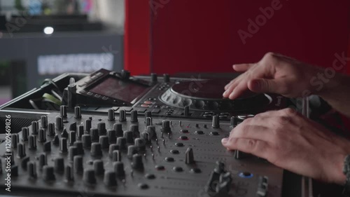 Exciting DJ Mixing Session on the Rooftop Featuring Modern Audio Equipment and Vibes