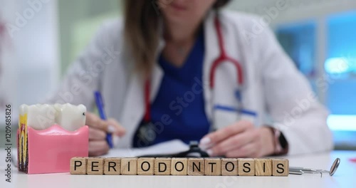 A dedicated medical professional comprehensively studies periodontosis, focusing on dental health and its treatment photo