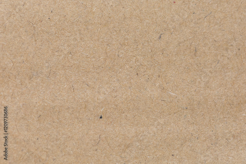 Close up of Old brown paper texture  visible. Paper fibers suitable for use as background images or decorations