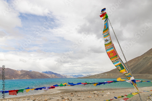 Beautiful landscape with mountains on the lake named Pagong Tso, or Pagong Lake, situated on the border with India and China, Leh, Ladakh, India. one of the world's highest brackish water lakes. photo