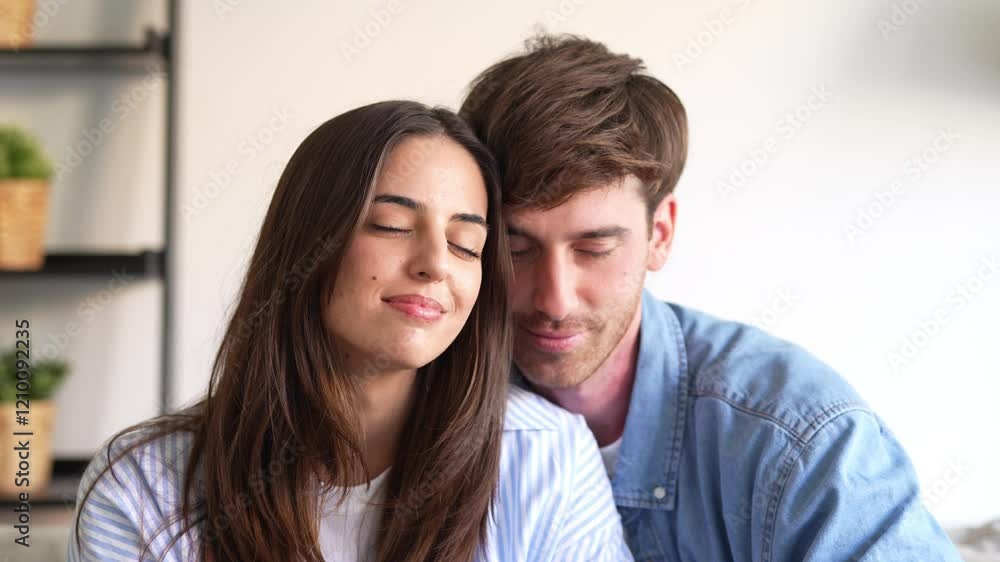 Portrait of young 20s just married couple in love posing photo shooting seated on couch in modern studio apartments, concept of capture happy moment, harmonic relationships, care and sincere feelings
Portrait of young 20s just married couple in love posing photo shooting seated on couch in modern studio apartments, concept of capture happy moment, harmonic relationships, care and sincere feelings