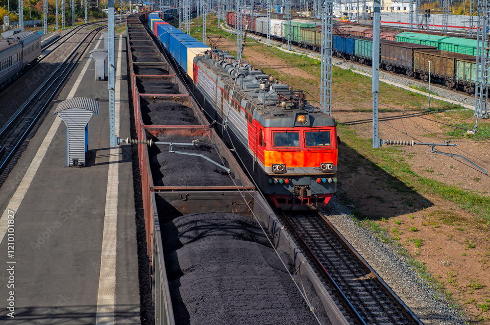 Railway Station with trains. Railroad wagons with coal. Transportation industry
Railway Station with trains. Railroad wagons with coal. Transportation industry