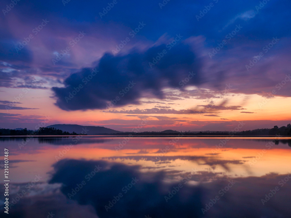 Fototapeta premium Morning light, mountain range, clouds, reflections on water