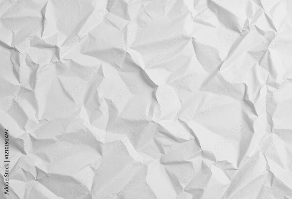 Obraz premium A crumpled white paper texture with visible folds and creases, creating a distressed appearance