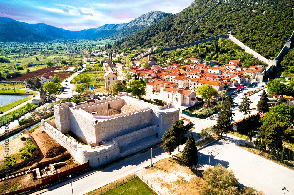 Historic town of Ston stone walls and landmarks aerial view