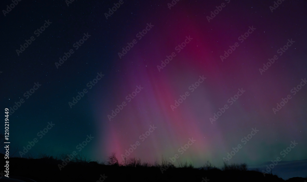 Aurora borealis, northern lights in scotland, britain bright, colourful and standing out Aurora borealis, northern lights in scotland, britain bright, colourful and standing out