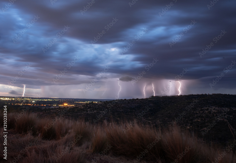 lightning in hills with stormy clouds lightning in hills with stormy clouds