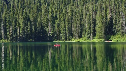 Cooper lake with canoe. Landscape of nature. Canoeing in summer vacation. Nature landscape. Cooper Lake vacation. Boating on the lake. Scenic nature of popular hiking and camping Cooper lake