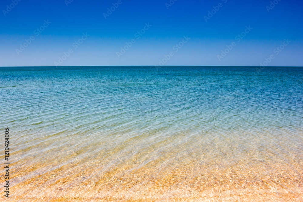 Fototapeta premium sea water surface with waves on the coast
