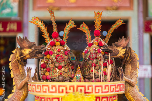 Red candles and burning incense sticks Paper gold with the Chinese alphabet Blessings written on it Is a Fortune blessing compliment for pay respect to god in Chinese New Year day at a Chinese shrine