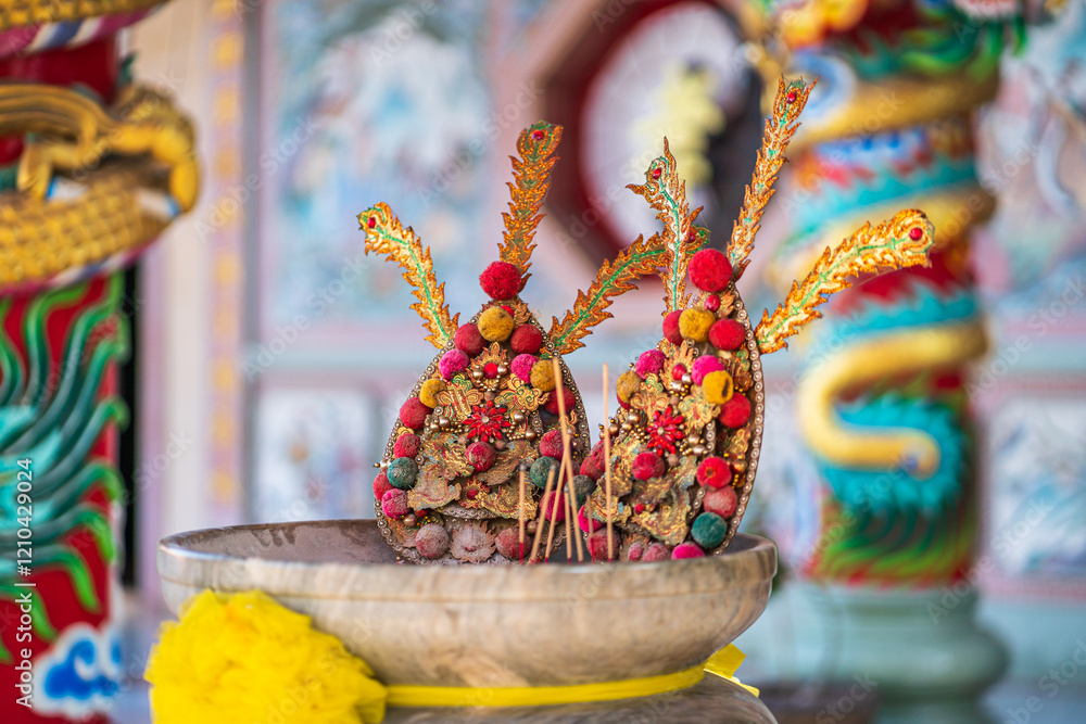 Red candles and burning incense sticks Paper gold with the Chinese alphabet Blessings written on it Is a Fortune blessing compliment for pay respect to god in Chinese New Year day at a Chinese shrine