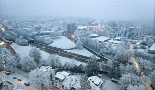 snowy city scape with busy ...