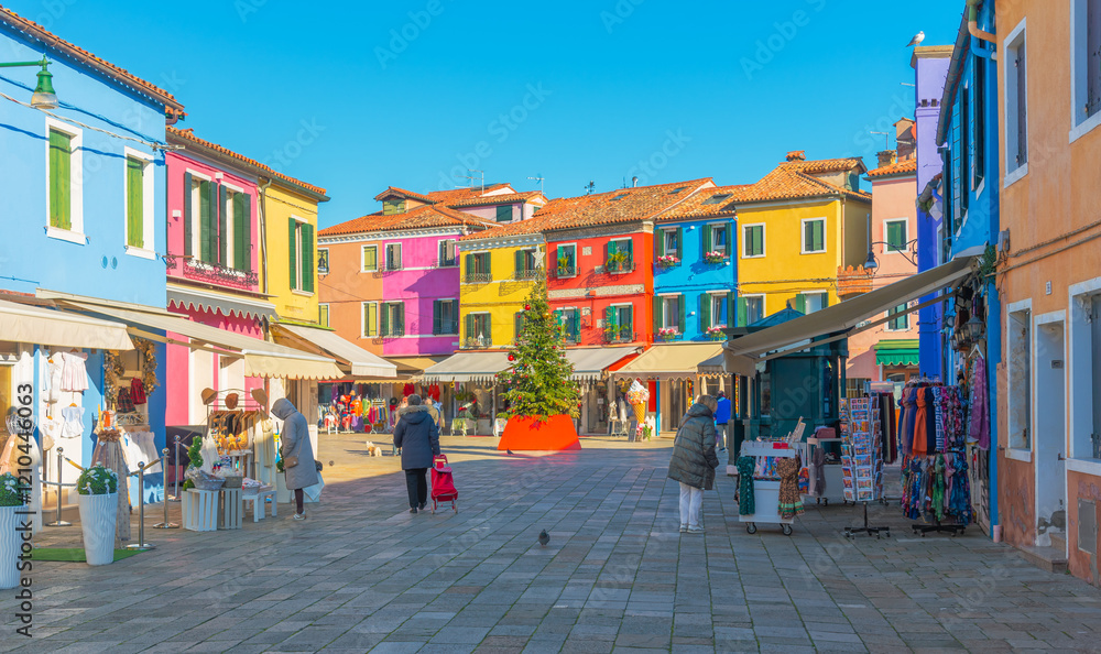 Obraz premium Festive square with colorful shops and a Christmas tree in Burano