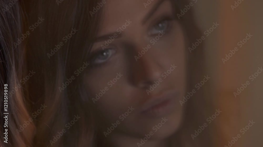 sad woman in the night: closeup portrait with reflection on the window sad woman in the night: closeup portrait with reflection on the window