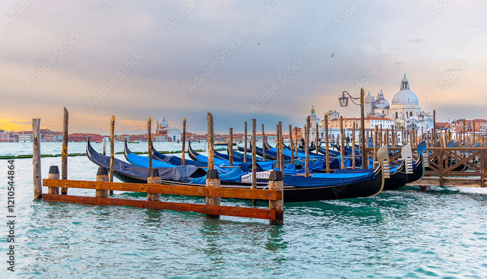 Venice. View of the Grand Canal, Basilica Santa Maria della Salute and wooden dock for gondola boats