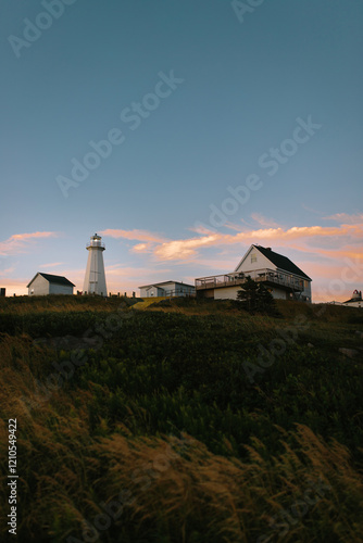 Cape Spear Lighthouse at sunset in Newfoundland, Canada photo