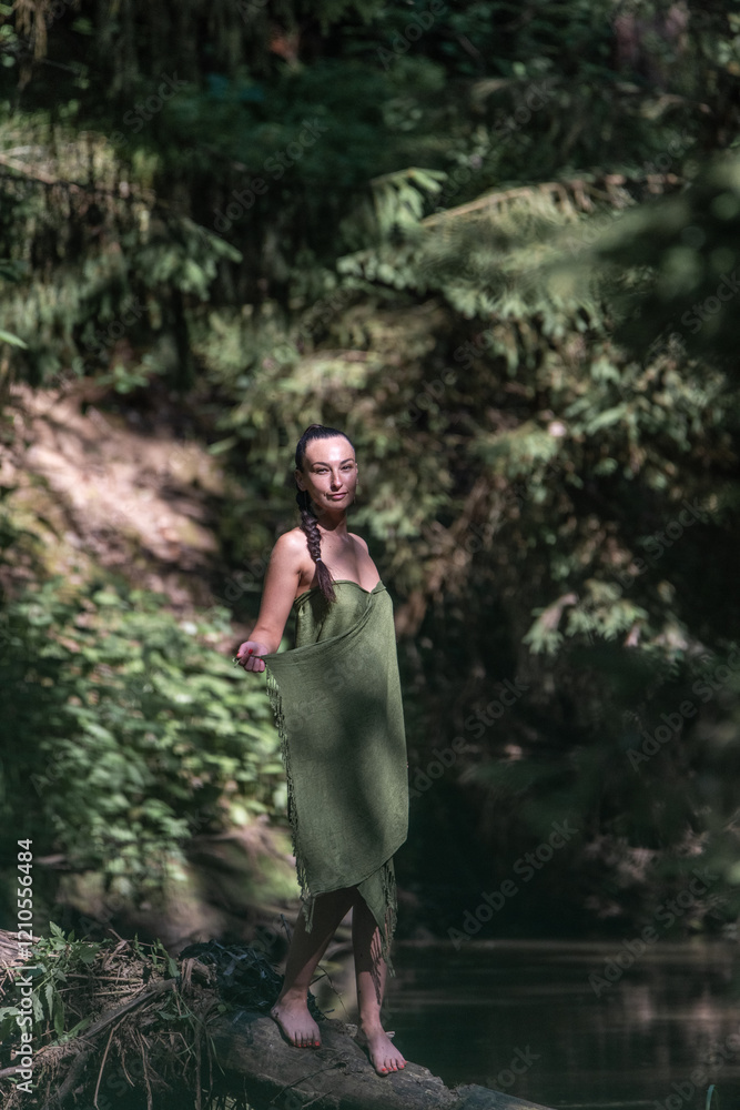 Beautiful young dark-haired girl in a forest river in summer. Beautiful young dark-haired girl in a forest river in summer.