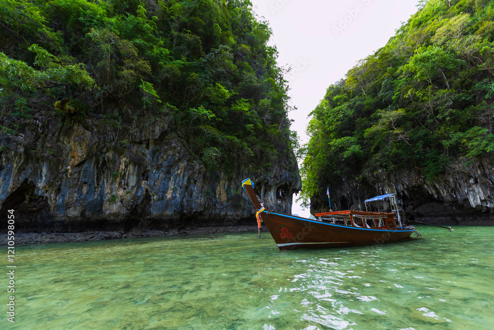 Hong Island Beach, and the traditional longtail boat Hong Island Beach, and the traditional longtail boat