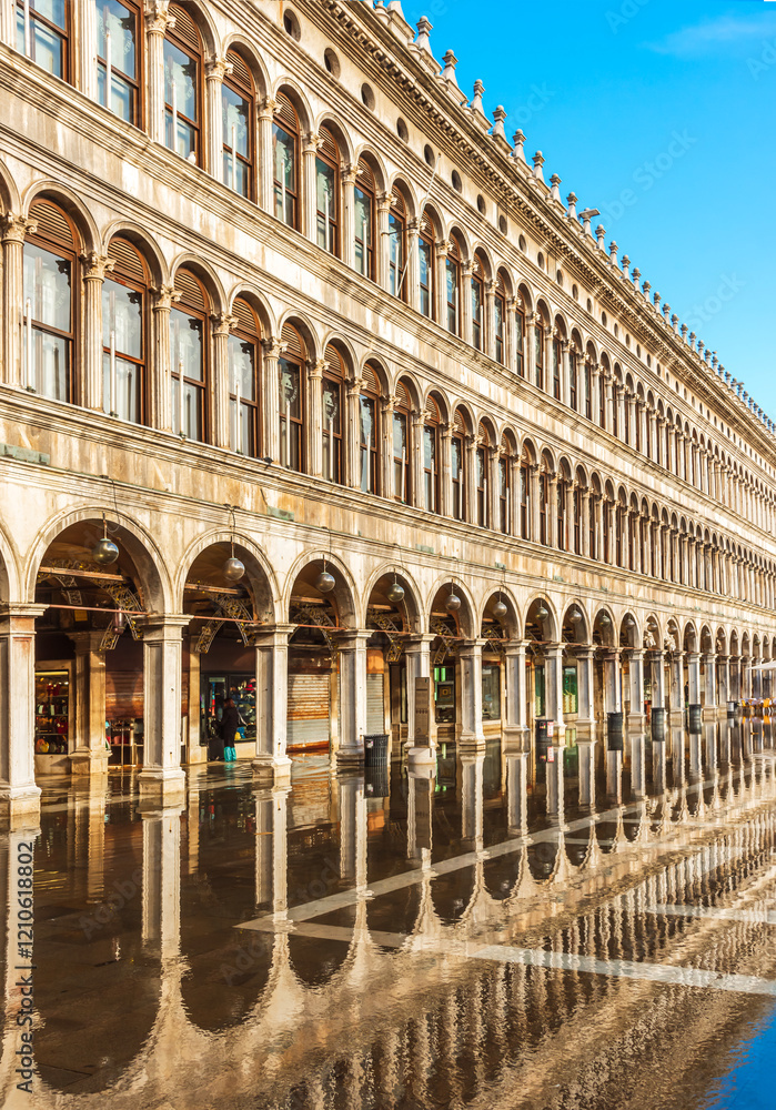 Venice, Italy. Central square. View of narrow old multi-story building with arches