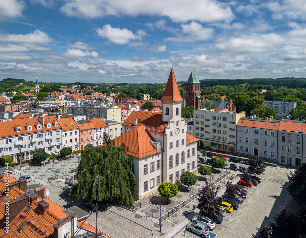 Summer skyline cityscape of town hall and market square (Ratusz i Rynek) in Trzebnica, Dolny Śląsk. Wide panoramic aerial view