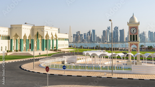 The view of Amiri Diwan government complex and Musheireb Mosque from the Corniche promenade in Doha, Qatar photo