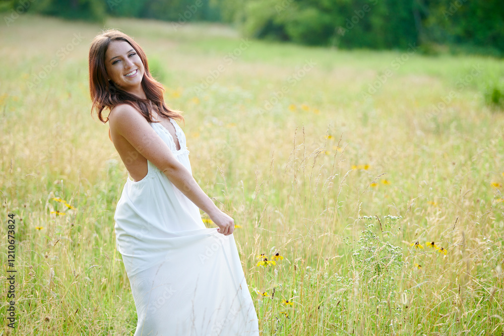 Stunning young Caucasian woman poses in white dressing field - summer fashion Stunning young Caucasian woman poses in white dressing field - summer fashion