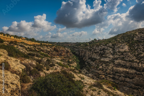 Rocks and cliffs near Blue Grotto in Malta. Wied i - urrieq south of urrieq in the southwest of the island of Malta. June 2023 photo