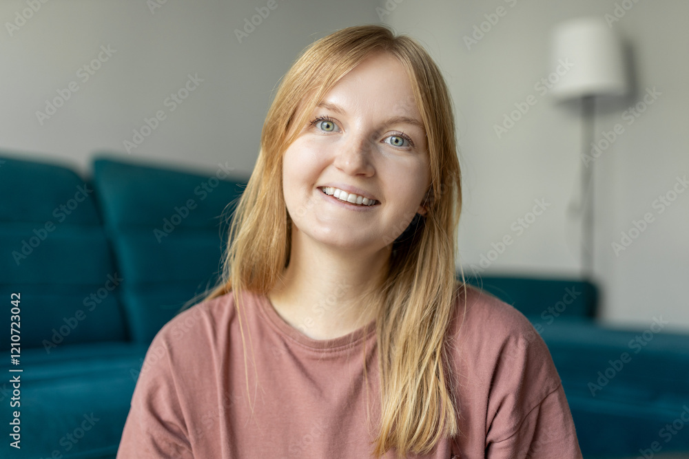 Close up face of woman with beautiful smile standing at home. 30s female rest and spend free spare time in living room indoors. People lounge concept