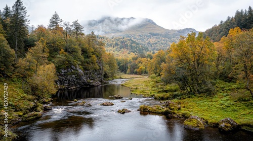 Autumnal river valley, misty mountains, fall foliage, tranquil scene, nature background