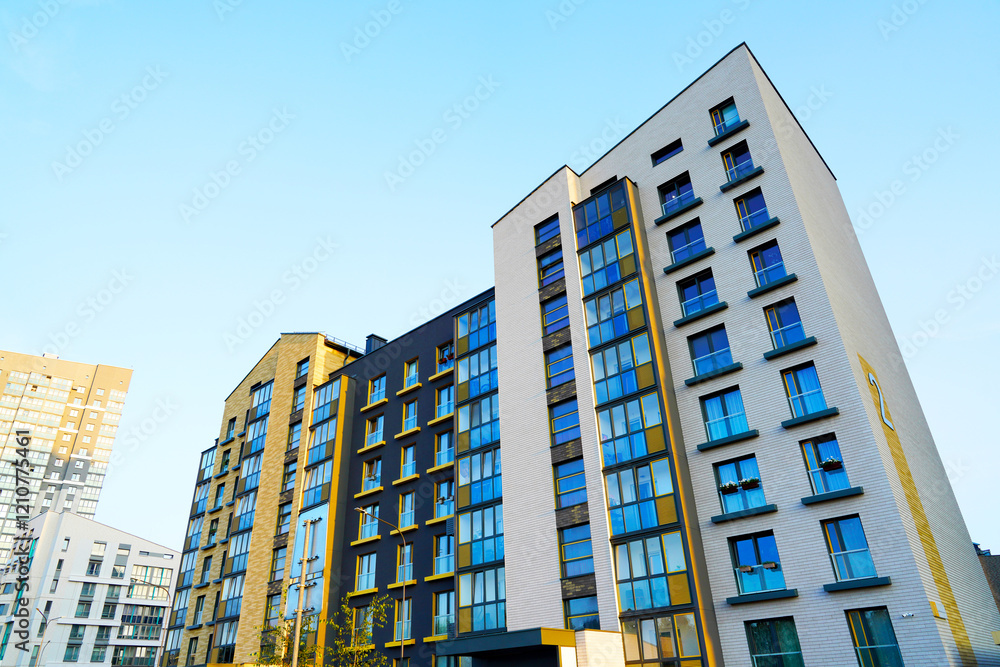 Modern facade building. Colorful high rise urban Modern house. Windows of Skyscraper. Architecture building exterior, window house block. High Rise house. Residential development in UK. City built. Modern facade building. Colorful high rise urban Modern house. Windows of Skyscraper. Architecture building exterior, window house block. High Rise house. Residential development in UK. City built.