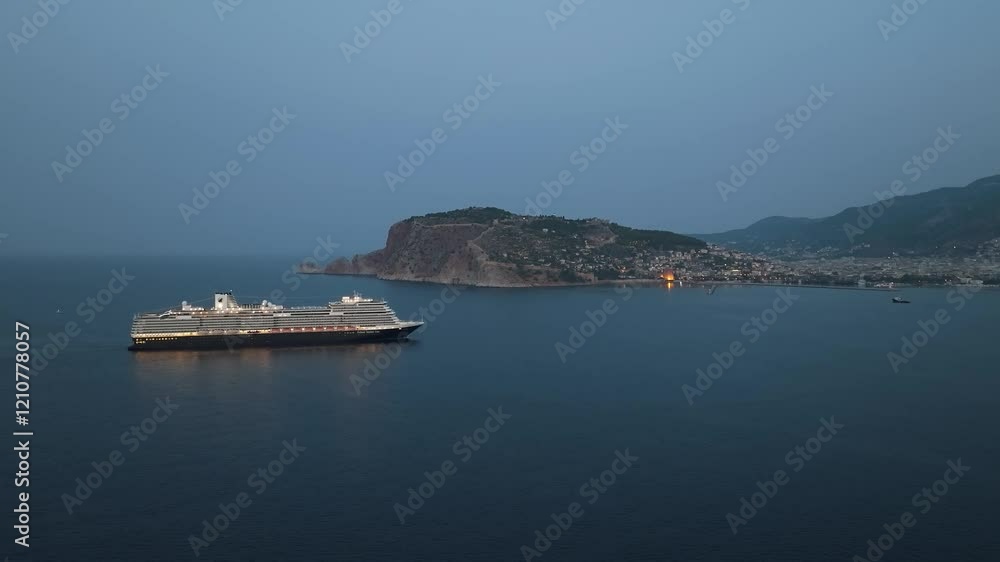 Sunrise over Cruise Ship and Alanya from a drone, Turkish Riviera on Mediterranean Coast, Antalya, Turkey Sunrise over Cruise Ship and Alanya from a drone, Turkish Riviera on Mediterranean Coast, Antalya, Turkey