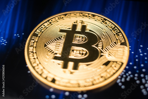 Golden Bitcoin Coin on Futuristic Digital Technology Background