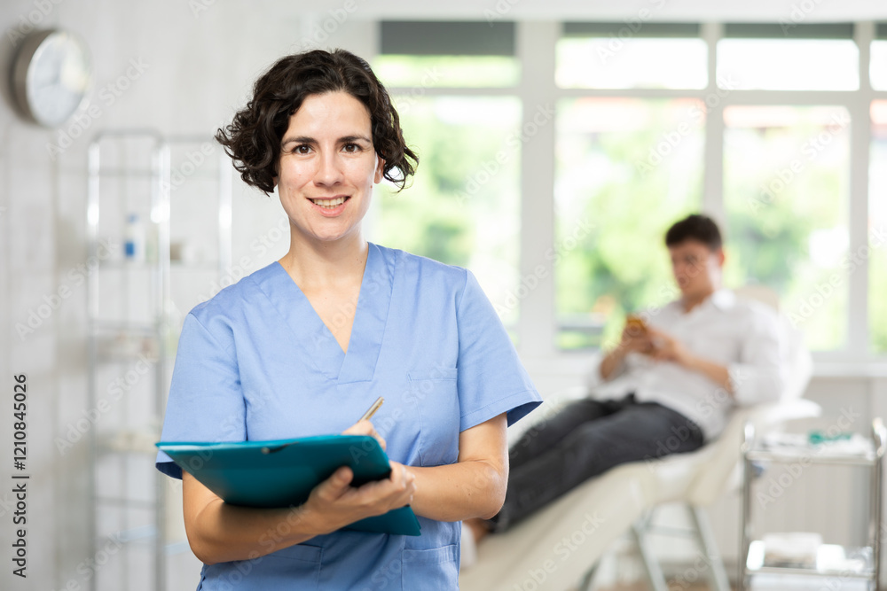Portrait shot of female doctor holding clipboard in hand while standing in medical esthetic office Portrait shot of female doctor holding clipboard in hand while standing in medical esthetic office