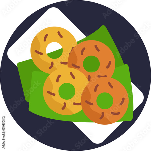 Medu Vada is a popular South Indian snack made from urad dal (black lentils), shaped like doughnuts and deep-fried until golden and crispy.