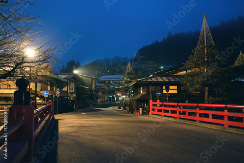 Gifu,Japan - January 19, 2025: Nakabashi bridge or Red bridge over Miyagawa river in Takayama, Gifu, Japan photo