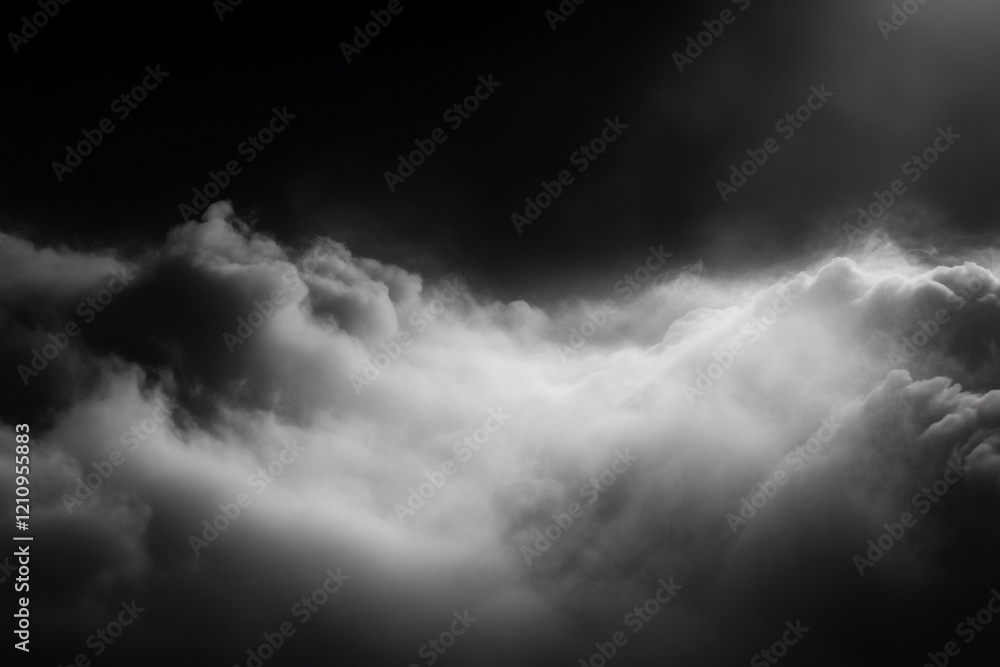 Obraz premium Dramatic monochrome cloudscape, dark moody sky with light breaking through.