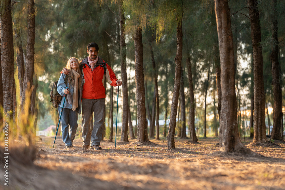 Two hikers standing in a forest, dressed in winter clothing with trekking poles and backpacks. A serene outdoor adventure showcasing nature, exploration, and friendship. Two hikers standing in a forest, dressed in winter clothing with trekking poles and backpacks. A serene outdoor adventure showcasing nature, exploration, and friendship.