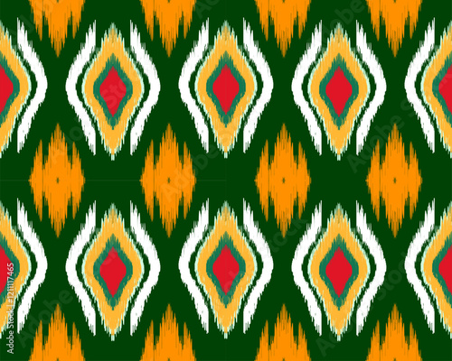 Colorful diamond pattern with green background, orange, red, and white accents creates vibrant and lively design. Perfect for textiles or wallpapers