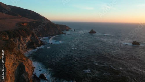 Rugged California coastline Big Creek Bixby Creek Bridge Big Sur sunset sunrise aerial drone waves Santa Lucia Mountains Apple Screensaver Pacific Ocean Coast Highways one scenic route forward motion
