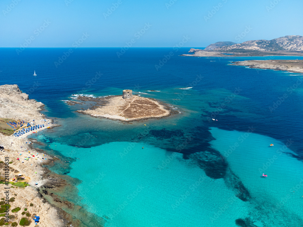 Aerial View of La Pelosa Beach in Sardegna (Sardinia), Italy - Mediterranean Paradise with Torre della Pelosa Aerial View of La Pelosa Beach in Sardegna (Sardinia), Italy - Mediterranean Paradise with Torre della Pelosa