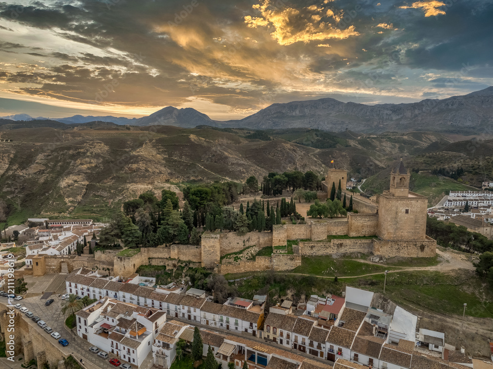 Obraz premium Aerial view of Antequera Moorish fortress with rectangular keep, city walls in Andalusia Spain