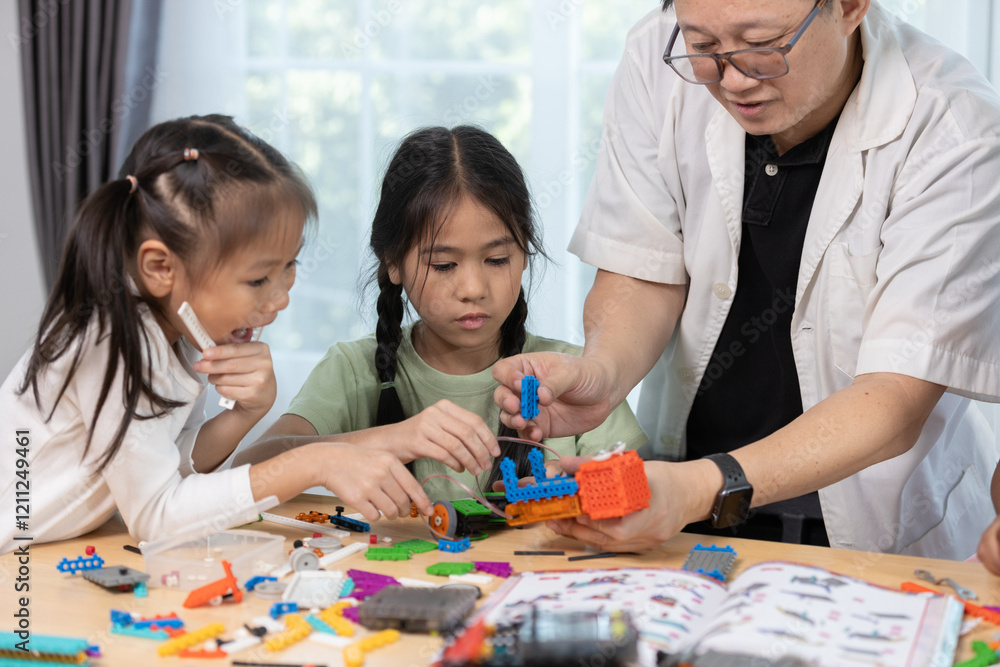 Education STEM children student classroom in school. Robot assembly training, brain development, Kid learning electrical future engineering. Education STEM children student classroom in school. Robot assembly training, brain development, Kid learning electrical future engineering.