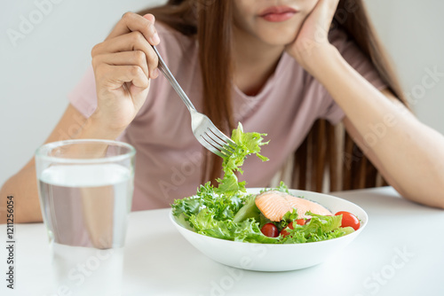 slim body asian women very bored diet food, dieting female choose low calories food for diet. Good healthy food. weight lose, balance, control, reduce fat, routines, exercise, body shape
