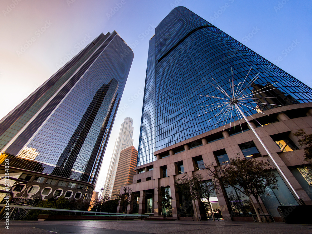 Tall skyscrapers and high rise buildings in downtown plaza setting during the day