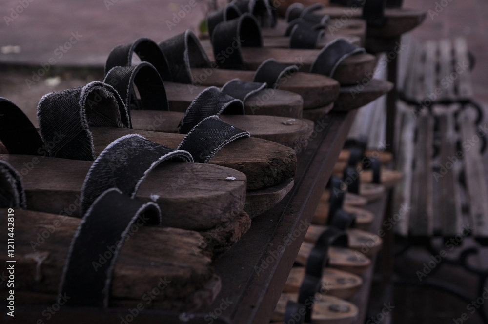 Obraz premium Wooden ablution clogs found in the shoe rack in the Sultan Mosque courtyard