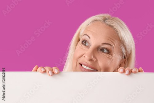 Mature woman with blank pos...